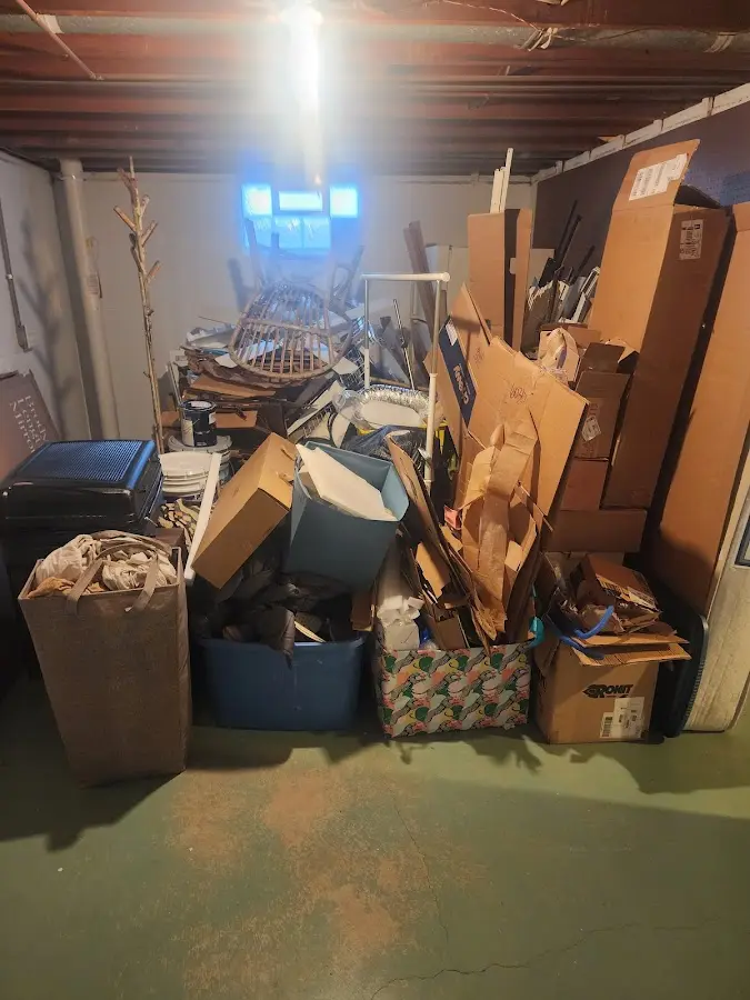 Roll-off dumpster container at job site for 15 Yard Dumpster Rental in Henderson